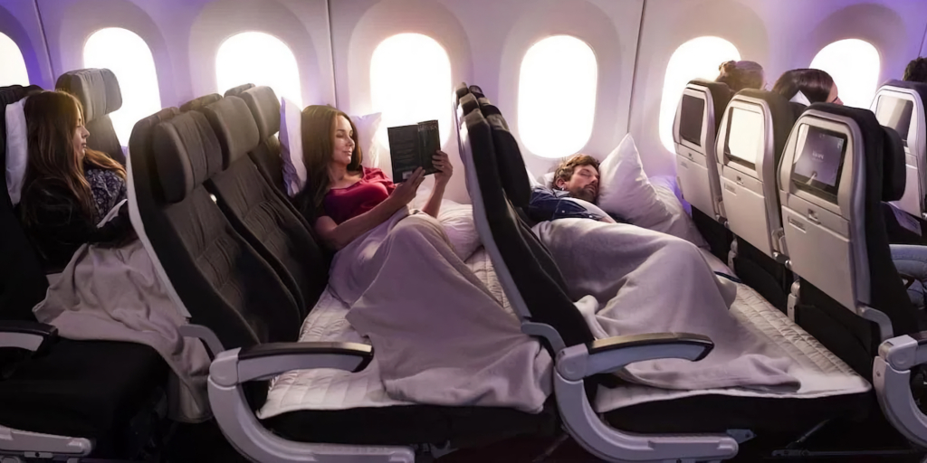 Sleep+ Аэрофлот человек спит в самолете на креслах